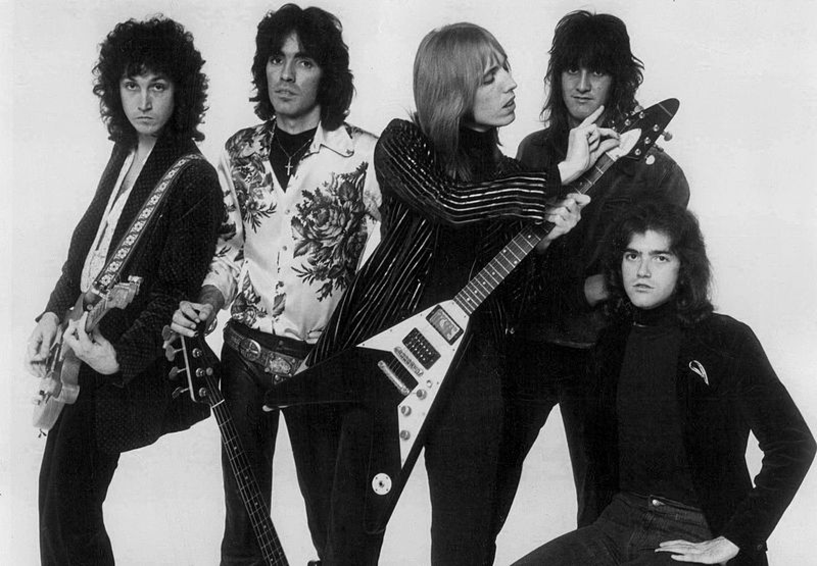Зарубежный рок группы 70 х список. Tom Petty and the Heartbreakers. Heartbreakers группа. Tom Petty and the Heartbreakers американская рок-группа. Tom Petty and the Heartbreakers 1976.